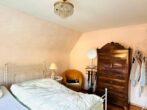 Attraktive Kapitalanlage: Charmantes Einfamilienhaus mit Garten in idyllischer Lage - Schlafzimmer OG
