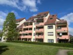 4-Zi.-Wohnung mit Dachterrasse, Einbauküche & 1 TG- + 1 Außenstellplatz – schöner Ausblick inklusive - Hausansicht