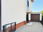 Vermietetes Mehrfamilienhaus mit 4 Wohneinheiten in ruhiger Feldrandlage - Hofeinfahrt