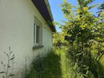 Einfamilienhaus mit Nebengebäuden auf großzügigem Areal (ca. 4.700 m²) in Hohensachsen - Zugang zum Garten