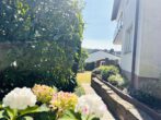 Familienidyll mit Ausblick in Altenbach: Haus mit Einliegerwohnung und flexibler Nutzung - Zugang zum Garten