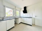 Lichtdurchflutete 4-Zi.-Wohnung mit Wärmepumpe, zwei Balkonen & Einzelgarage – bezugsfrei - Küche
