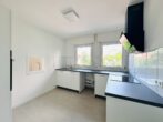 Lichtdurchflutete 4-Zi.-Wohnung mit Wärmepumpe, zwei Balkonen & Einzelgarage – bezugsfrei - Küche