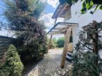 Viel Platz für Ihre Wohnideen: Reihenendhaus mit großem Garten und Zusatzfläche - Hauseingang